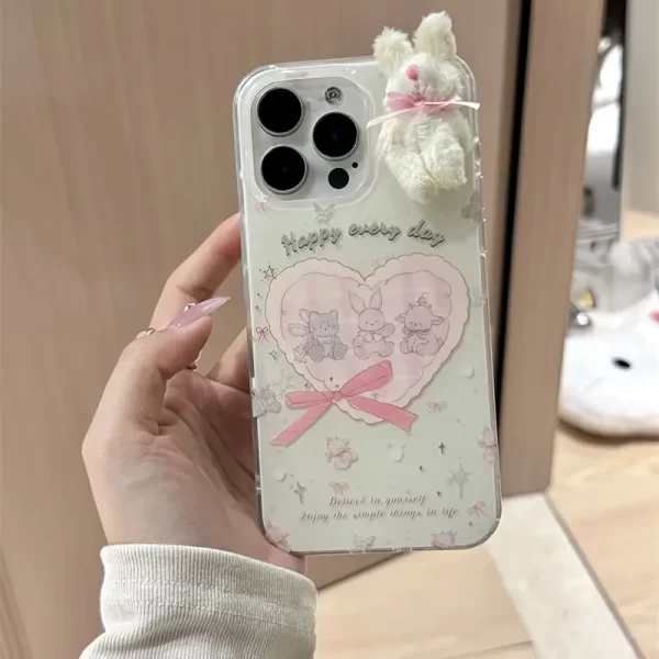 Crystal clear white heart-shaped butterfly rabbit cat phone case with plush bowknot rabbit doll, suitable for iPhone 15 16 Pro Max