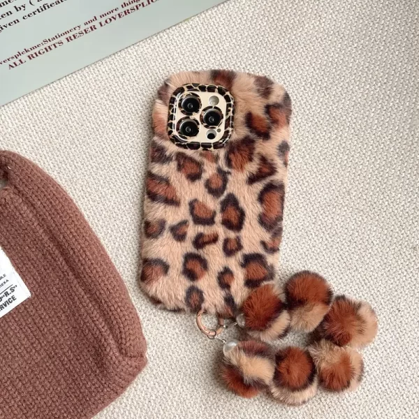 Leopard print lens holder bracelet strap phone case, suitable for Apple 16/15 Pro Max/15 Pro/15/15Plus girls' plush phone protective cover