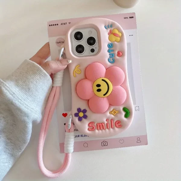 Original smile flower stand silicone phone case + lanyard, suitable for iPhone 15/16pm plus, featuring butterfly elements, niche max style, sweet soft shell, non-scratching, thick, super protective protective case