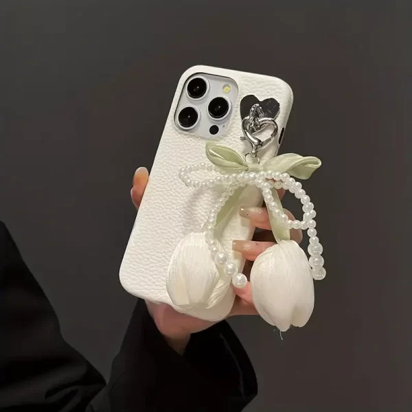 Elegant white litchi pattern phone case, adorned with bowknot and tulip pendant, suitable for iPhone 15 Pro Max - fashionable and high-end protective cover for women's phones